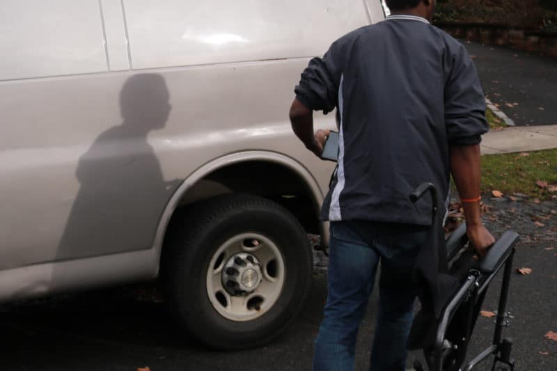 Maplewood NJ, 12/17/18 FREDERIQUE PICKS UP WHEELCHAIR
Wuthnay Frederique picks up a defective wheelchair from a patient and goes to his truck to fetch a new one.