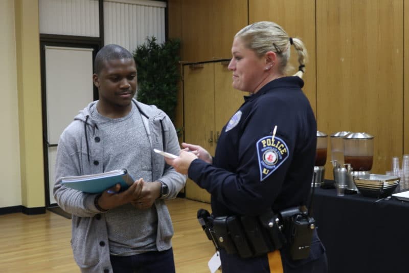 Montclair, NJ 11/1/18 First annual Community Relations Expo: At Student Center, Ballrooms Montclair State University, Students gather to ask police questions police excessive force.