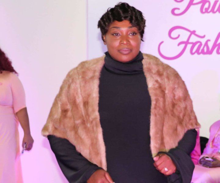 BROOKLYN, NY 10/28/18 2ND ANNUAL POWER IN PINK FASHION SHOW: First-time model Laiara Powell changes clothing and walks the runway. Powell is modelling clothing made by ICYCONNECTIONS designer Rainee Taitt. Photo by Babee Garcia