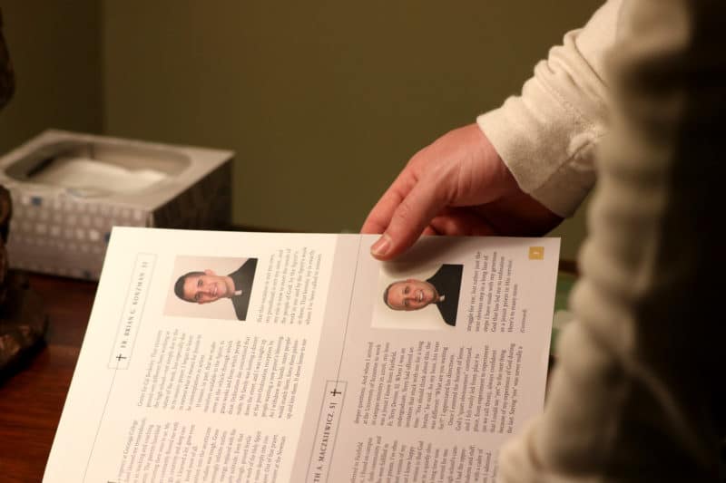 CLIFTON, NJ 10/30/18 DAN ROBINSON READS BIOGRAPHIES OF JESUIT PRIESTS:
Newman Catholic Missionary Dan Robinson reads biographies of priests who support the mission of hope.
-Photo by Katherine Braunstein